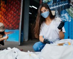 young-woman-sorting-garbage-concept-of-recycling-2021-08-28-12-04-48-utc.jpg